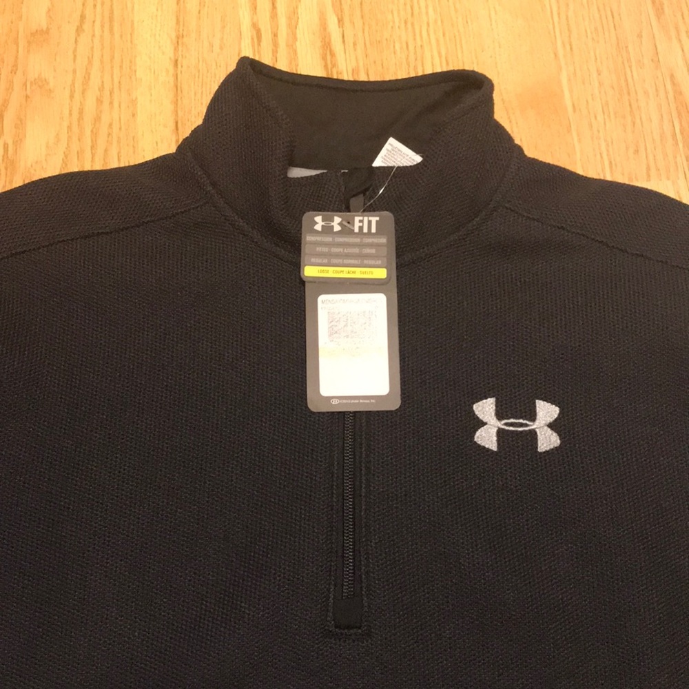 NWT Men’s Black quarter zip Under Armour jacket.